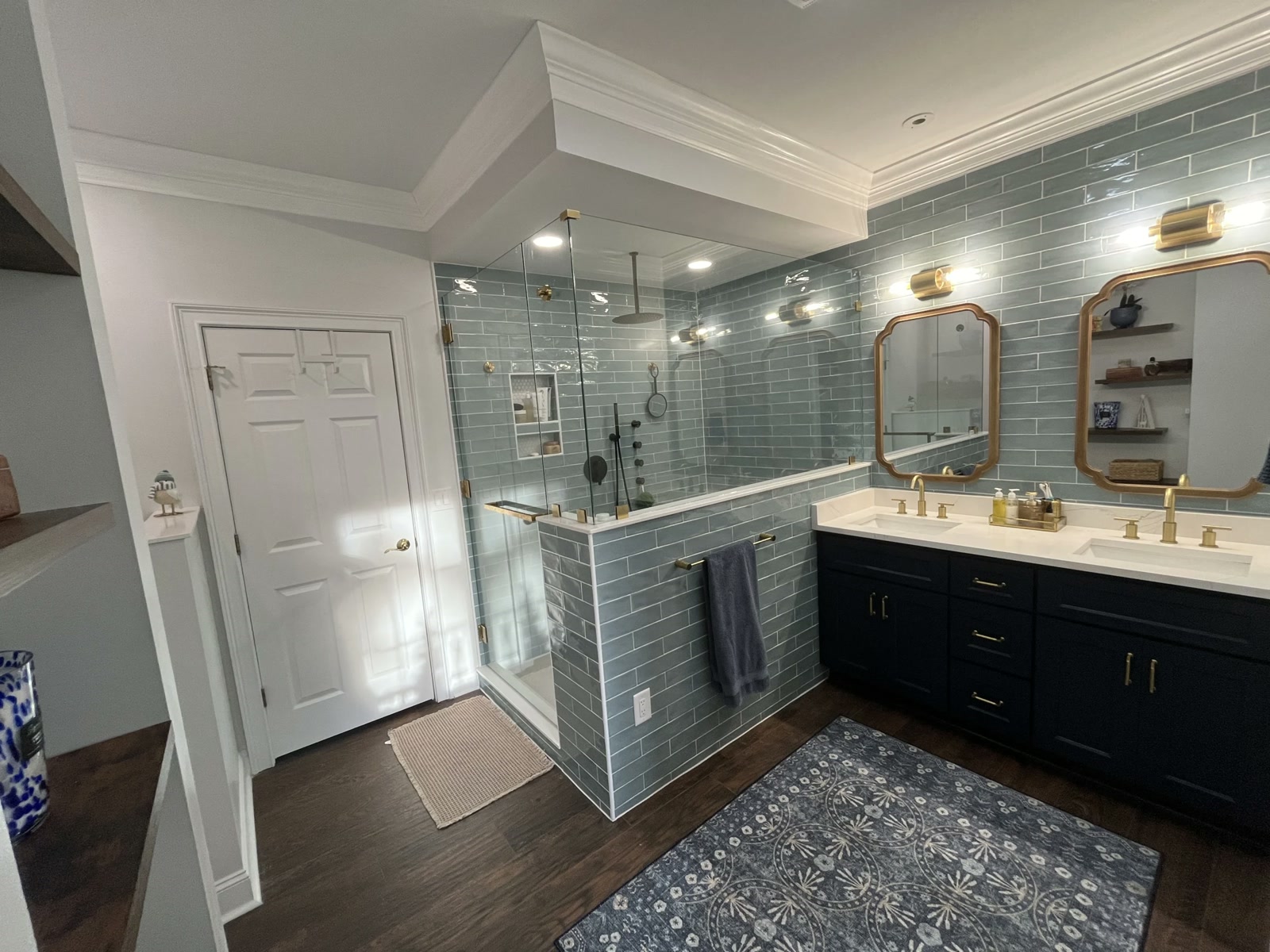 Bathroom with double vanity and glass shower
